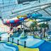 Fairfield Inn & Suites by Marriott Rapid City indoor water park with slides, pool, and seating