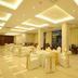 Oak Ray Heritage Hotel in Kandy dining room with set tables and large windows overlooking the city