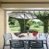 Club Belambra Le Vidourle in Le Grau-du-Roi, covered patio dining area opening to a garden