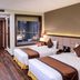 Muong Thanh Luxury Lang Son Hotel guest room with two twin beds and wood-look flooring