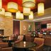 Courtyard by Marriott Los Angeles Sherman Oaks lounge bar with pendant lights and fireplace