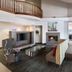 Residence Inn by Marriott Santa Clarita Valencia lobby with fireplace, TV area and seating