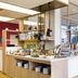 ibis Styles Versailles Guyancourt breakfast bar with stools and buffet in Guyancourt