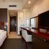S Peria Hotel Nagasaki compact guest room with single bed, desk, and TV in Nagasaki