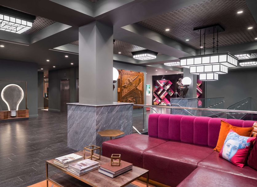 TRYP by Wyndham Newark Downtown lobby lounge with modern seating and geometric pendant lights in Newark