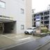 Daiwa Roynet Hotel Sendai entrance with covered parking and a parked car in Sendai