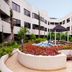 Beijing Hwa Apartment Hotel in Beijing courtyard with pool, gazebo, and landscaped garden