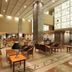 Hotel Jal City Tsukuba lobby with seating area, tall columns and high ceiling in Tsukuba