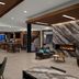 Delta Hotels by Marriott Thunder Bay lobby lounge with fireplace, bar seating and floor-to-ceiling windows