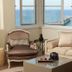 Grand Hotel Heiligendamm in Bad Doberan lounge with sea-view windows, sofa, armchair and coffee table