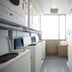 Dormy Inn Miyazaki Natural Hot Spring laundry room with stacked washers and dryers