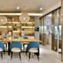 Hanting Express Hangzhou Cuiyuan Branch meeting room with long table, blue chairs and shelving in Hangzhou