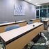 SpringHill Suites by Marriott Phoenix Goodyear meeting room with tables, chairs and floor-to-ceiling windows