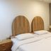Suriwongse Hotel Bangkok guest room with twin beds and wood headboards