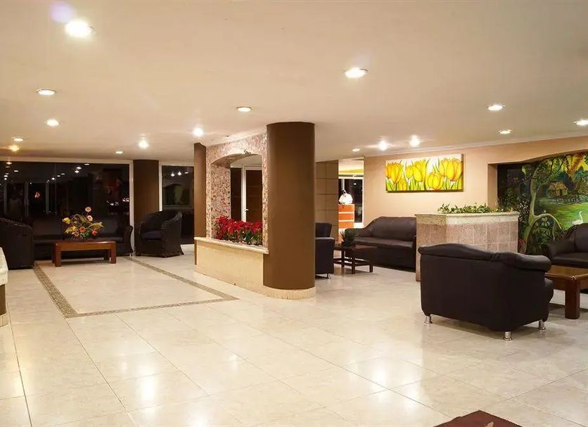 Hotel Graham Villahermosa lobby with seating area and reception desk in Villahermosa