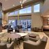Residence Inn by Marriott Salt Lake City-West Jordan lobby with fireplace, high windows and seating area