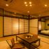 Ooedo Onsen Monogatari Kaike in Yonago: Japanese-style room with tatami mats, low table, and twin beds
