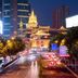 Hengshan Garden Hotel in Shanghai with a city street view and illuminated temple skyline at night