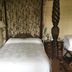 Spread Eagle Tavern and Inn in Hanoverton, guest room with four-poster bed and floral curtains