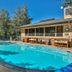 Canyon Creek in Steamboat Springs with outdoor pool and lounge seating under a clear blue sky