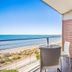 Onslow Beach Resort in Onslow balcony with table and chairs overlooking the beach and ocean