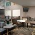Residence Inn by Marriott Lubbock Southwest lobby lounge with fireplace, seating area and TVs