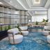 JW Marriott Gold Coast Resort & Spa lounge in Surfers Paradise with blue circular rug, chairs and large windows