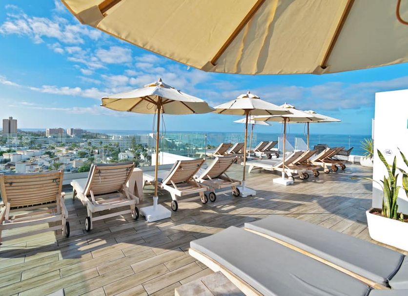 Coral Ocean View - Adults Only in Adeje: rooftop terrace with loungers, umbrellas and ocean views