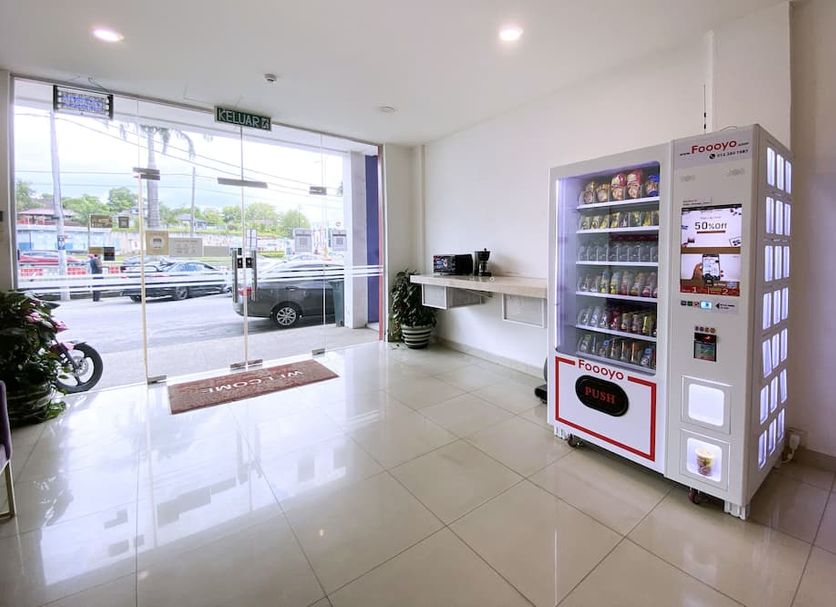 D'concept Hotel Kulim lobby with glass entrance and vending machine in Kulim