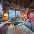 Hotel Principe Delle Nevi, Breuil-Cervinia: cozy suite with mountain-view windows, sofa, and wood beams