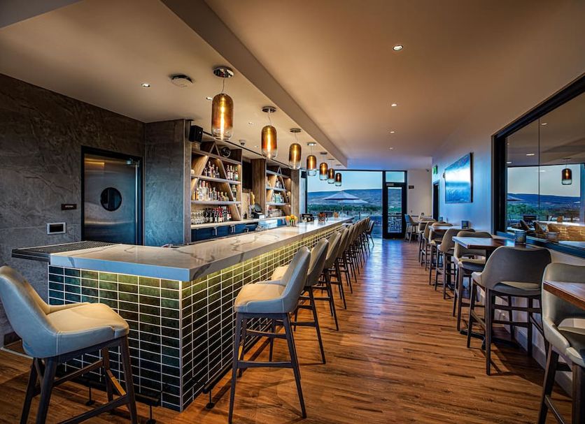 Hotel Maverick in Grand Junction rooftop bar with counter seating and mountain views