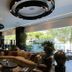 Grand Fiesta Americana Guadalajara Country Club lobby with lounge seating, circular ceiling lights and city views