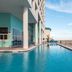 Hampton Inn & Suites Panama City Beach-Beachfront pool deck with ocean views in Panama City Beach