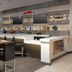 Crowne Plaza San Antonio Airport bar and lounge with high-top tables and illuminated liquor shelves