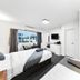 Golden Hills Motel Bendigo room with two beds, TV, and window view