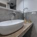Soggiorno Alessandra Florence bathroom with vessel sink, stone vanity and walk-in shower