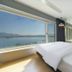 JK Hotel Busan room with large window and harbor view