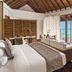 Anantara Dhigu Maldives Resort villa bedroom with oceanfront terrace and turquoise sea views, Dhigufinolhu