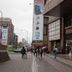 Taipei Star Hotel in Taipei City with a street-level entrance on a rainy city sidewalk
