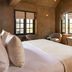 Hôtel Saint-Delis - La Maison du Peintre room in Honfleur with large windows and a king bed