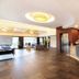 Landhaus Lauble lobby in Hornberg with reception desk, seating area and modern lighting