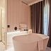 Hotel Plaza Obradoiro by Bossh! Hotels bathroom with freestanding tub, double sink vanity and shower in Santiago de Compostela