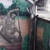 Hotel Dez De Julho in Manaus mural of two men in a canoe on a river by tropical trees