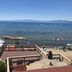 Crown Motel in Kings Beach with lakefront deck, beach, and kayaks on the water