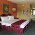 Motel 6 Bracey, Va I 85 guest room with king bed and dresser in South Hill