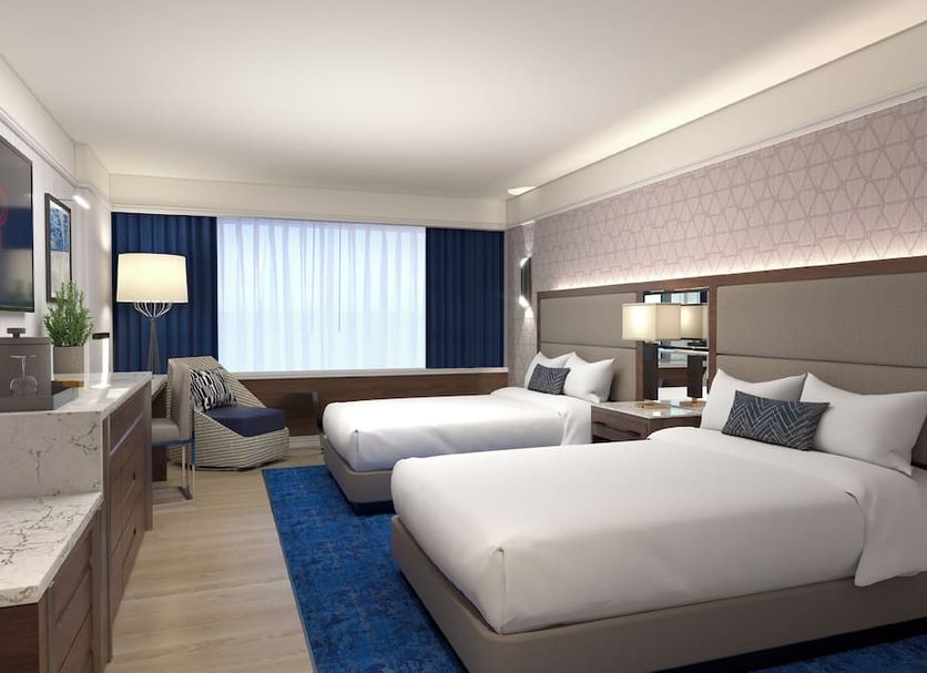 Bally's Atlantic City Hotel & Casino guest room with two beds and a city-view window