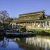 Haostay in Fujikawaguchiko with Mount Fuji, a pond reflection, and traditional Japanese buildings