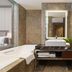 The Longemont Shenyang bathroom with soaking tub, vanity sink, and glass shower