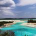 Stella Maris Resort Club in Stella Maris with turquoise lagoon and sandy shoreline