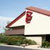 Red Roof Inn Detroit - Farmington Hills exterior in Farmington Hills with sloped roof and landscaping
